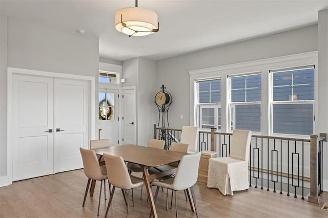 dining room with wood finished floors