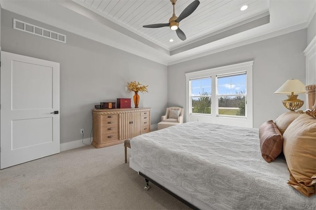 bedroom featuring baseboards, visible vents, wood ceiling, a raised ceiling, and carpet flooring