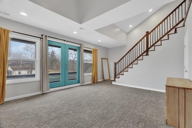 carpeted entrance foyer with stairway, recessed lighting, visible vents, and baseboards