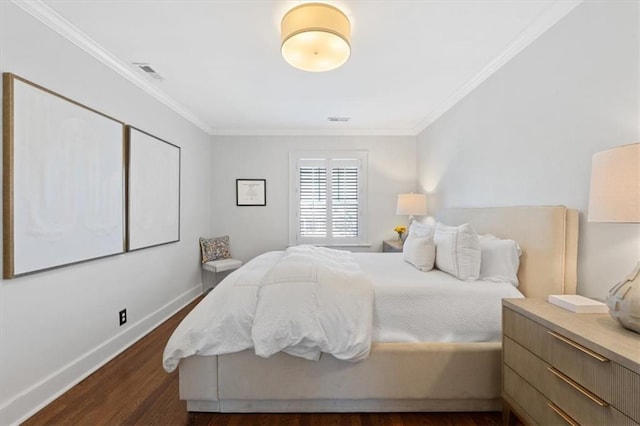 bedroom with visible vents, baseboards, dark wood-style flooring, and crown molding