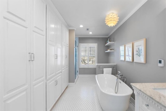 full bathroom featuring a shower stall, crown molding, baseboards, a soaking tub, and vanity