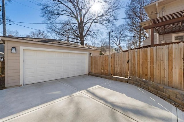 detached garage with fence