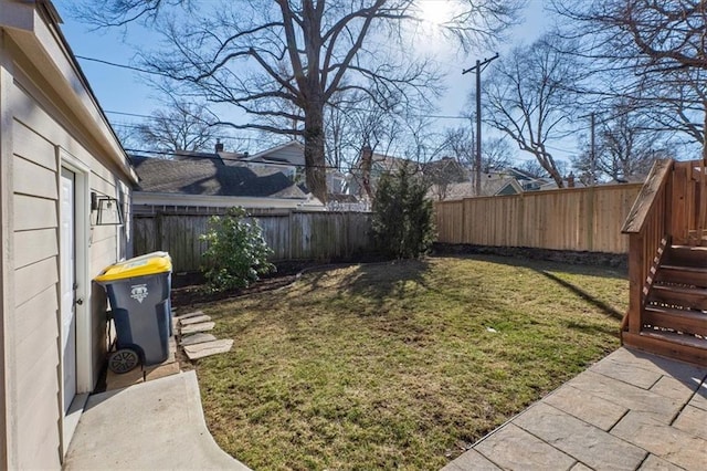 view of yard featuring a fenced backyard