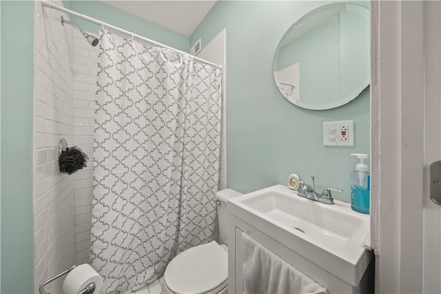 full bath with vanity, a shower with shower curtain, and toilet