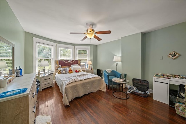 bedroom featuring ceiling fan and wood-type flooring