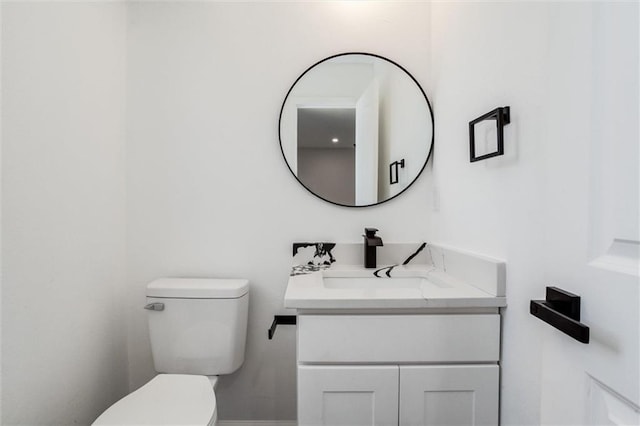 half bath with toilet and vanity