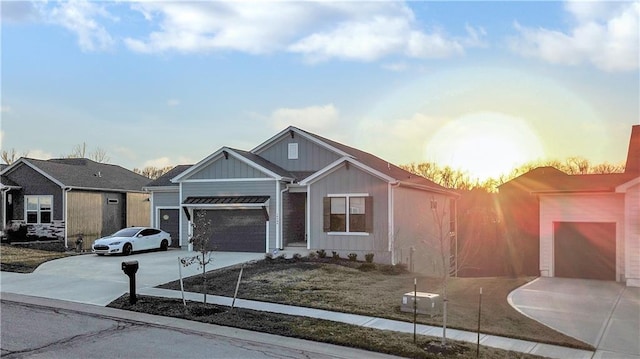 single story home featuring board and batten siding, concrete driveway, and a garage