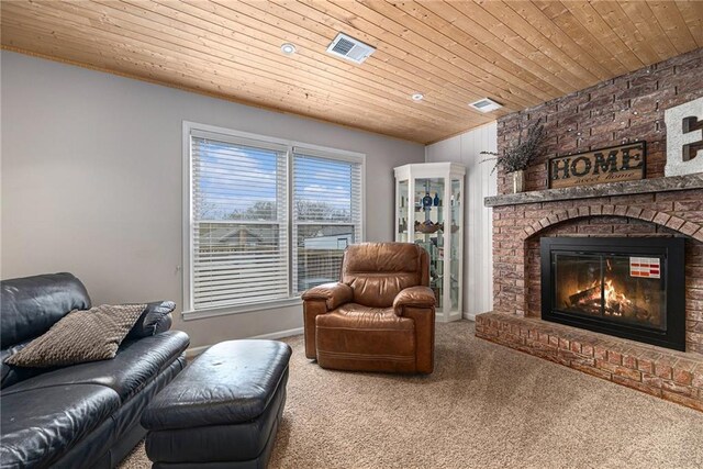 1008 Bristol Way, Liberty, MO 64068 - living room featuring visible vents, a brick fireplace, wooden ceiling, and carpet floors