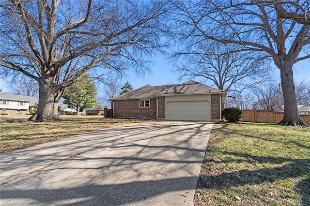 view of side of home with concrete driveway, a garage, fence, and brick siding