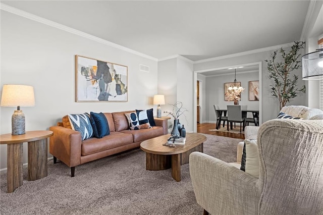 carpeted living area featuring crown molding, baseboards, and a chandelier