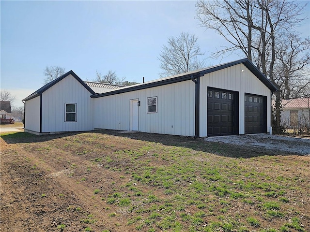 view of front of house featuring a detached garage