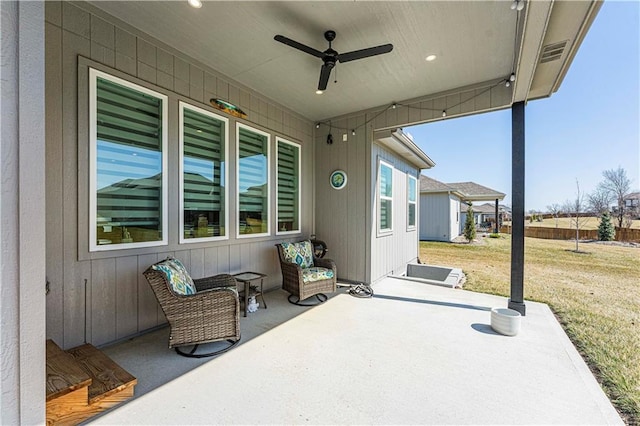 view of patio / terrace with visible vents and ceiling fan