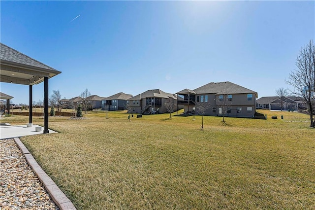 view of yard with a residential view