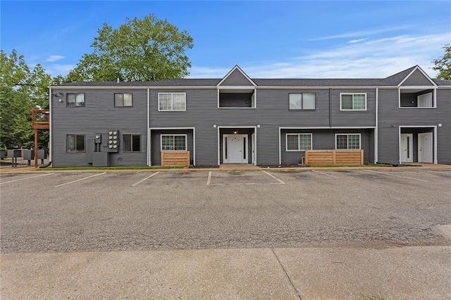 view of front of home featuring uncovered parking