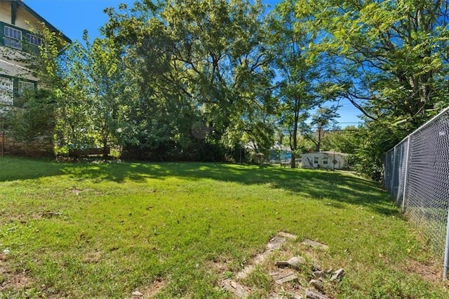 view of yard featuring fence