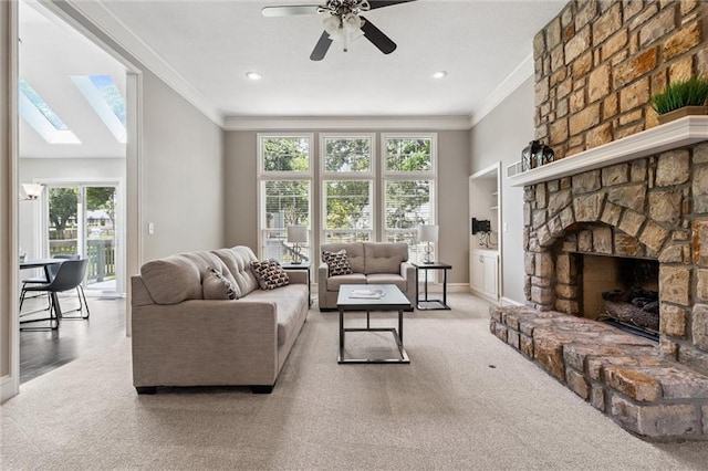 12109 Overbrook Ct, Leawood, KS 66209 - living room with crown molding, healthy amount of natural light, a ceiling fan, carpet, and recessed lighting