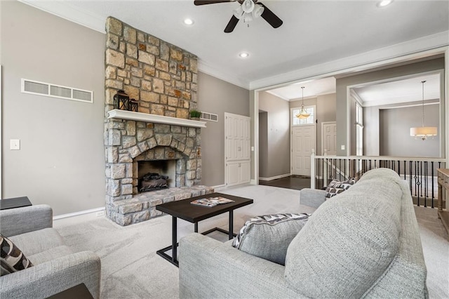12109 Overbrook Ct, Leawood, KS 66209 - carpeted living area featuring ornamental molding, a ceiling fan, recessed lighting, and a fireplace