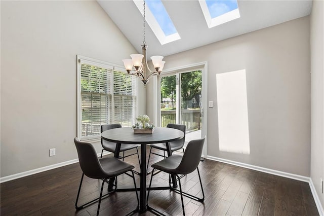 12109 Overbrook Ct, Leawood, KS 66209 - dining space featuring a chandelier, a skylight, dark wood-type flooring, and high vaulted ceiling