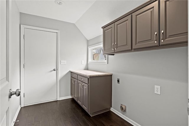 12109 Overbrook Ct, Leawood, KS 66209 - laundry room featuring hookup for an electric dryer, dark wood-style floors, and cabinet space