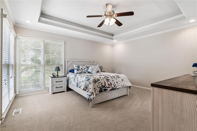12109 Overbrook Ct, Leawood, KS 66209 - bedroom featuring a raised ceiling, light colored carpet, crown molding, ceiling fan, and recessed lighting