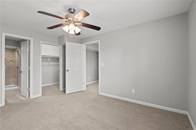 12109 Overbrook Ct, Leawood, KS 66209 - unfurnished bedroom featuring carpet flooring, a ceiling fan, and connected bathroom