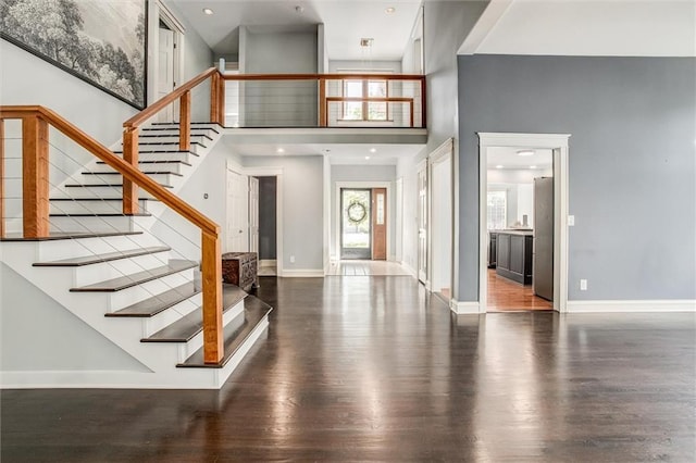 4837 W 121st St, Overland Park, KS 66209 - entryway featuring a towering ceiling, wood finished floors, stairway, and recessed lighting