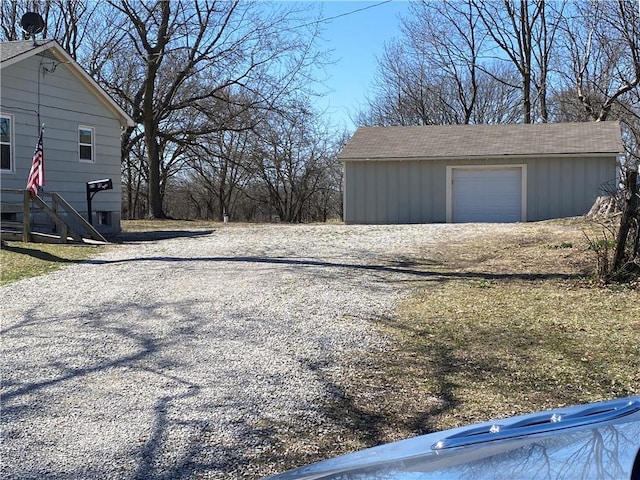 exterior space featuring gravel driveway