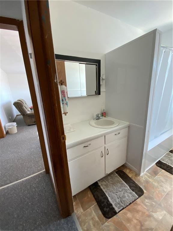 full bathroom featuring vanity and curtained shower