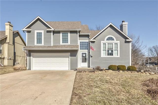 view of front of home with driveway, fence, an attached garage, a shingled roof, and a chimney