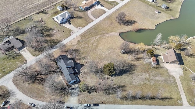 drone / aerial view with a water view