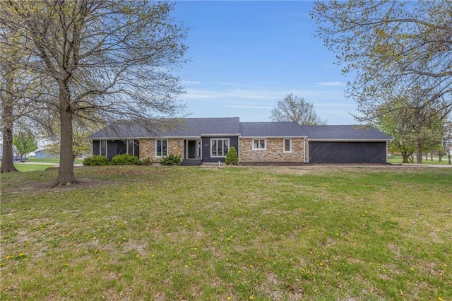 single story home with a front yard