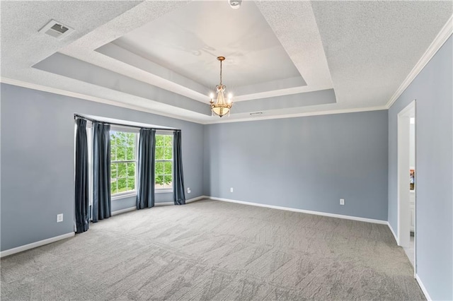 24987 W 150th Ct, Olathe, KS 66061 - carpeted spare room featuring a raised ceiling, a textured ceiling, and visible vents