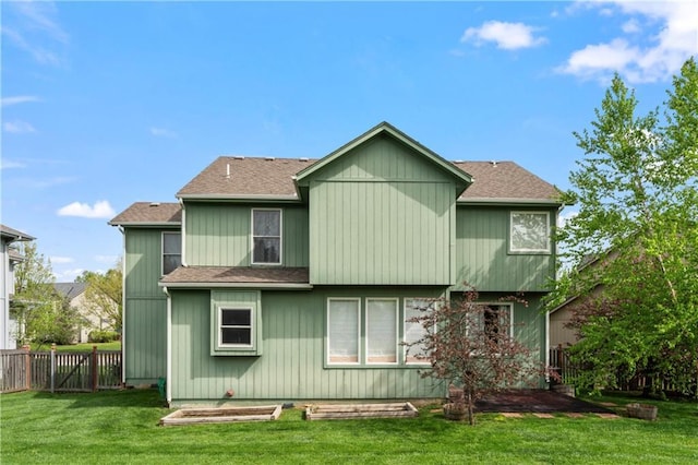 24987 W 150th Ct, Olathe, KS 66061 - rear view of house with a lawn, a shingled roof, and fence