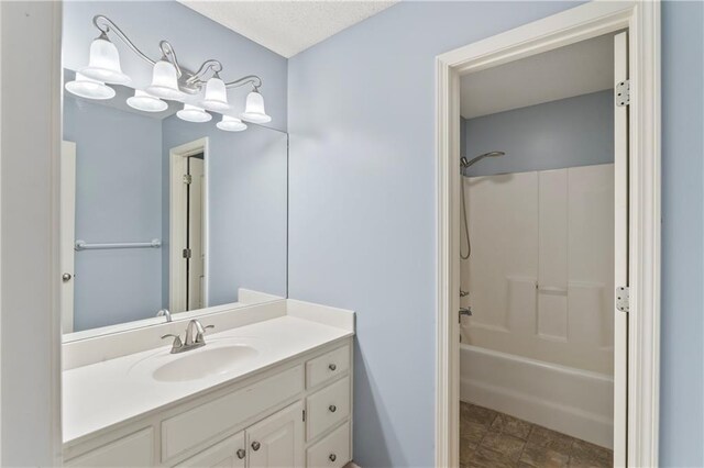 24987 W 150th Ct, Olathe, KS 66061 - bathroom featuring vanity and tub / shower combination