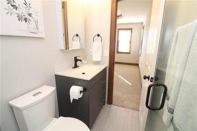 full bath with vanity and toilet