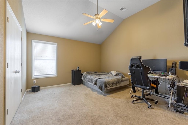 carpeted bedroom with visible vents, lofted ceiling, baseboards, and a ceiling fan