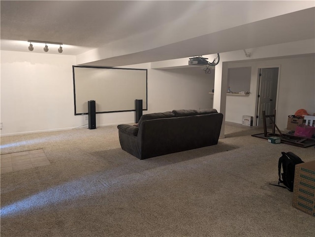 7730 N Shannon Ave, Kansas City, MO 64152 - carpeted cinema room featuring track lighting and baseboards