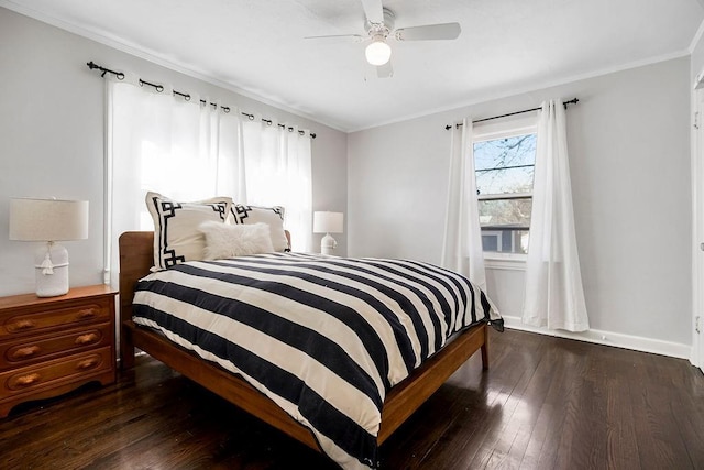 bedroom featuring hardwood / wood-style flooring, a ceiling fan, baseboards, and ornamental molding