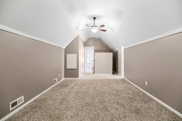 bonus room with visible vents, carpet, baseboards, ceiling fan, and vaulted ceiling