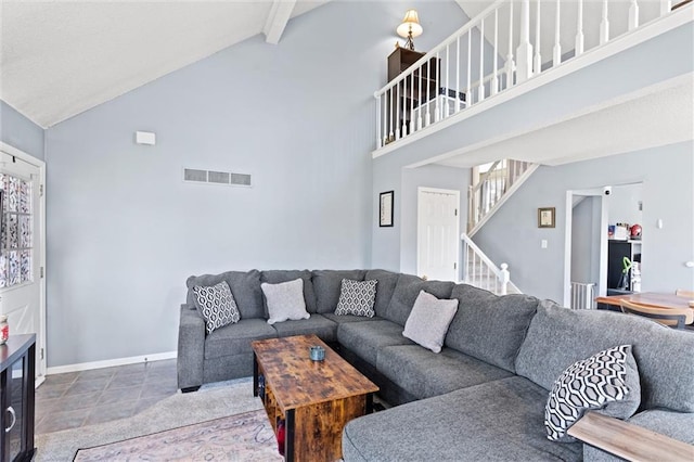 living room featuring visible vents, beam ceiling, high vaulted ceiling, stairway, and baseboards