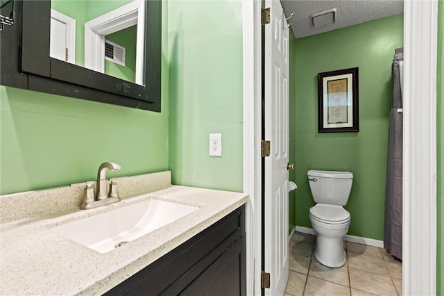 full bath with vanity, visible vents, a textured ceiling, tile patterned floors, and toilet