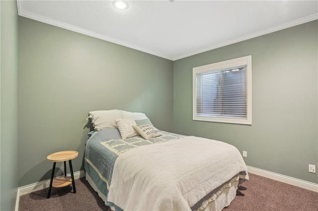 carpeted bedroom featuring baseboards and ornamental molding