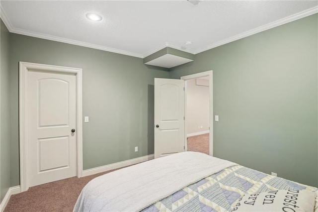 carpeted bedroom featuring baseboards and ornamental molding