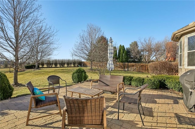 view of patio / terrace featuring fence