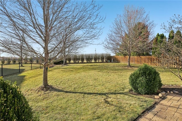 view of yard with fence