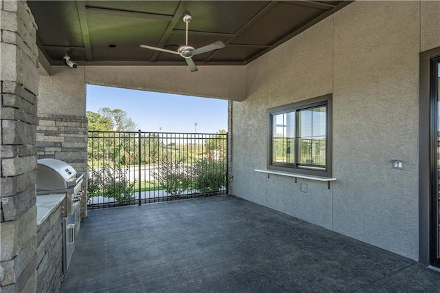 exterior space featuring area for grilling and ceiling fan