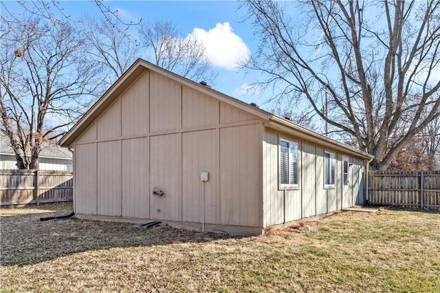 view of outdoor structure featuring a fenced backyard