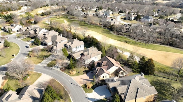 birds eye view of property with a residential view and view of golf course