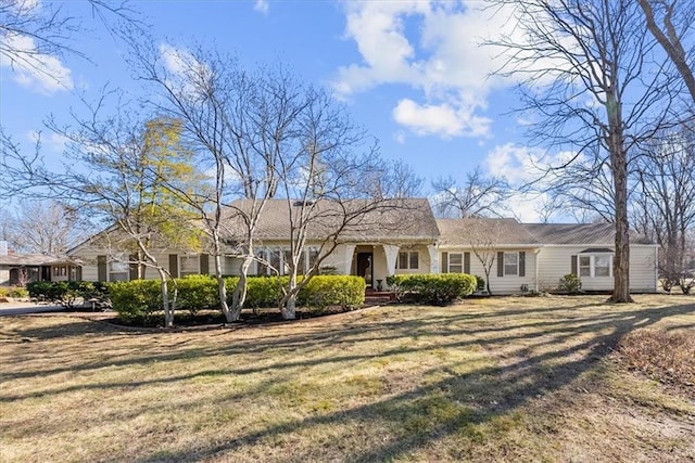 ranch-style house with a front yard