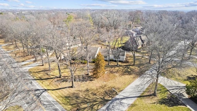 drone / aerial view with a view of trees